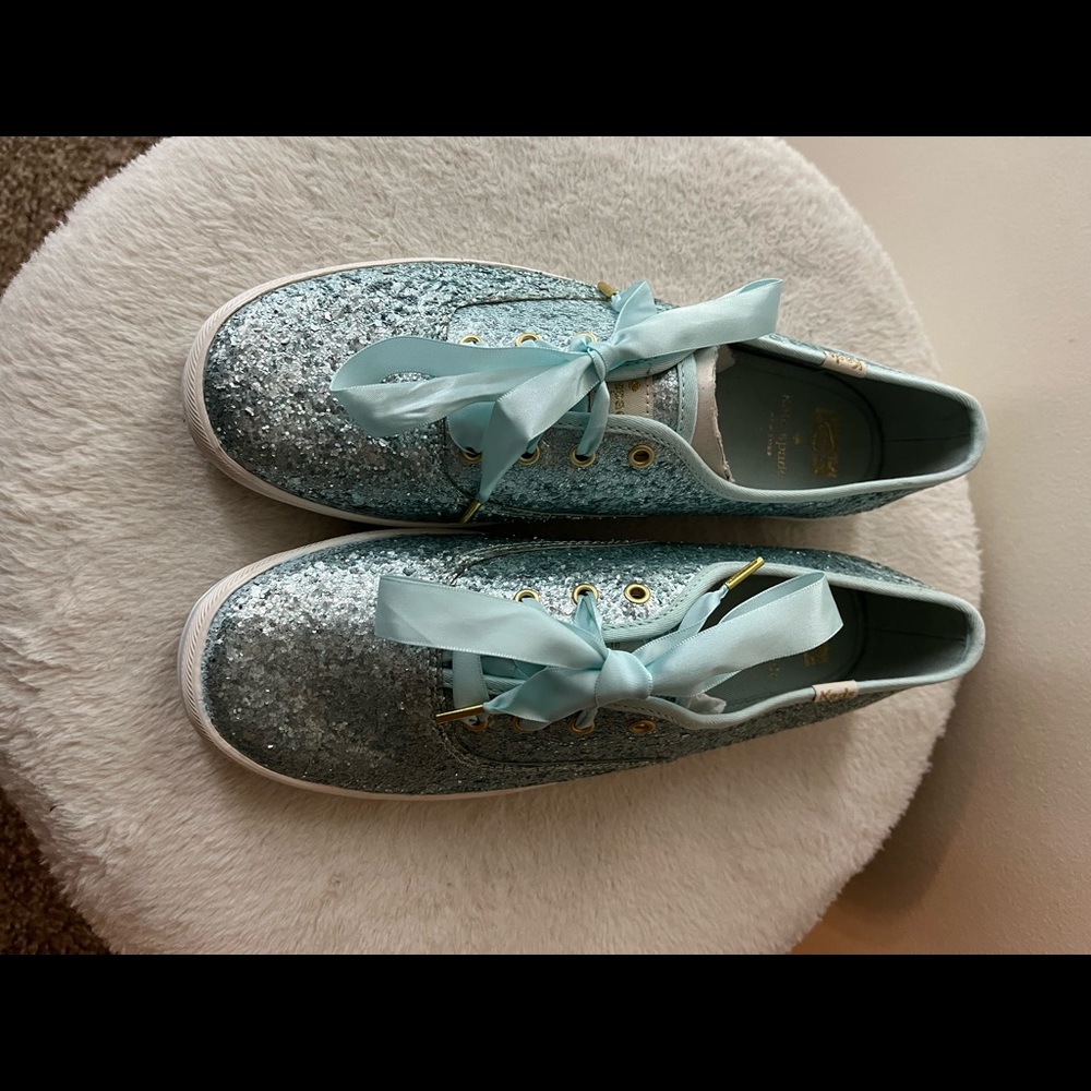 Brand new, never worn. Light Blue Kate Spade Keds.
